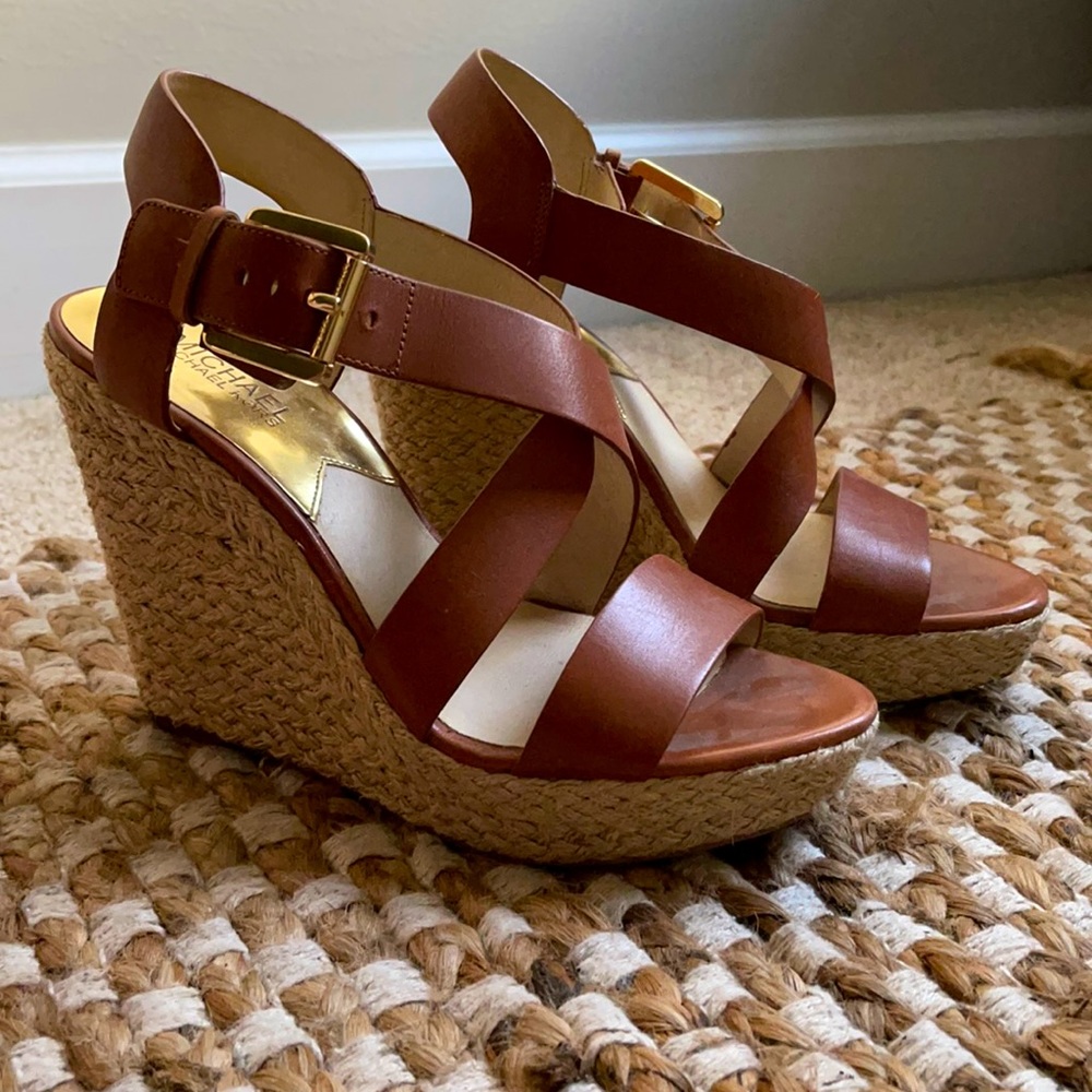 Leather brown and tan Michael Kors shoes.
